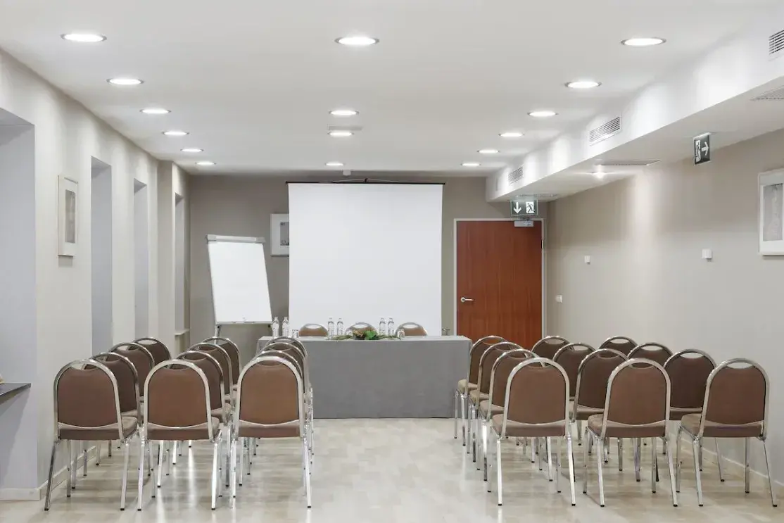 Meeting room arranged in theatre style at Exe Vienna Hotel